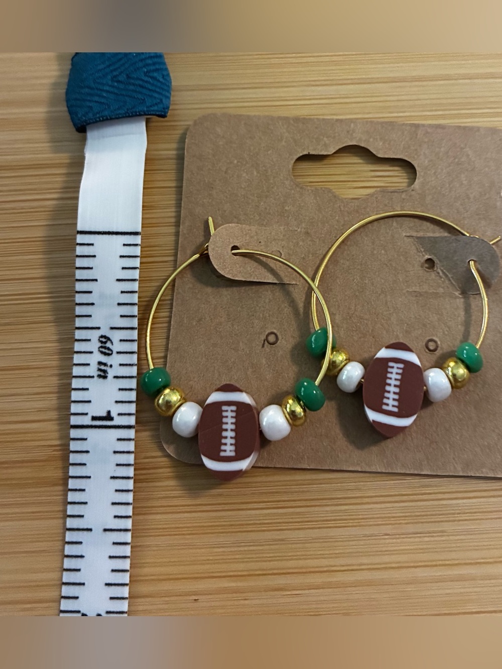 Gold Hoop Earrings with Football Bead and Green Accents - Picture 3 of 3